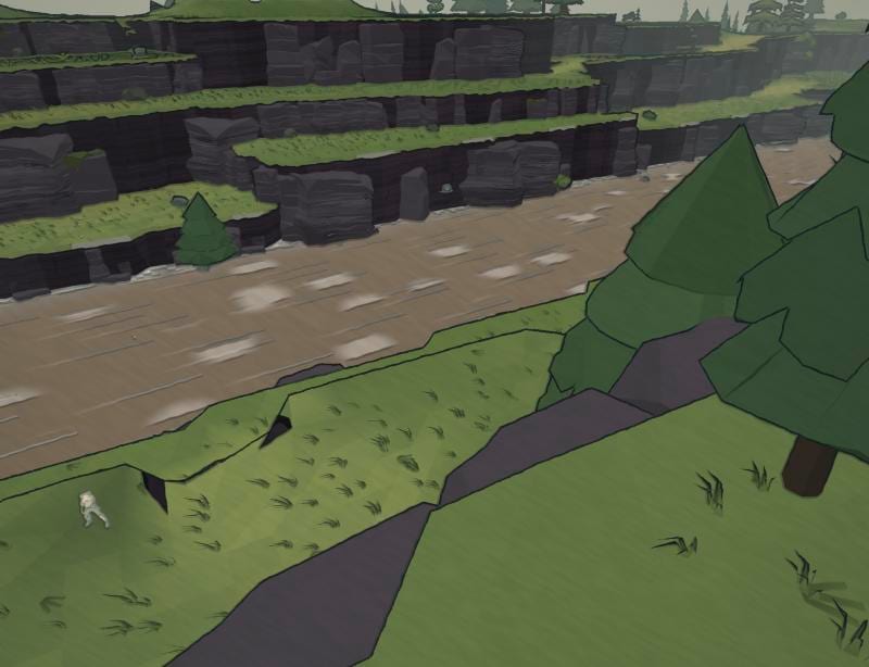 The river swollen and brown with silt between grassy terraces