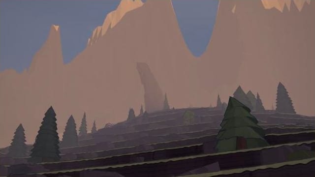 A rock spire catching first light above shadowed terraces